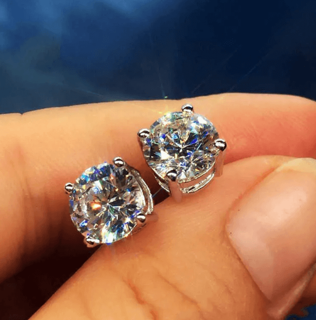 Серьги с блестящими камнями Серебро 925 пробы, цирконы
