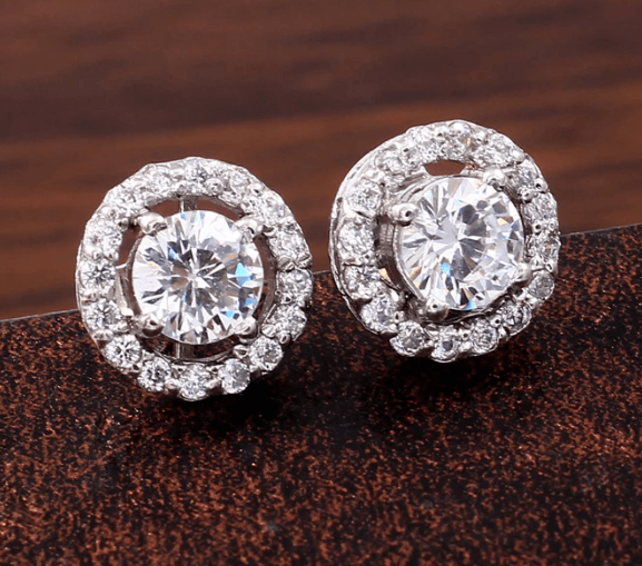 Серебряные серьги-гвоздики с круглыми одинарными подвесками и кубическим цирконием /  Серебро 925 пробы, цирконы
